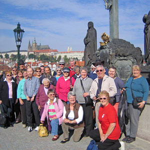 Tour group enjoying Charles Bridge, Prague